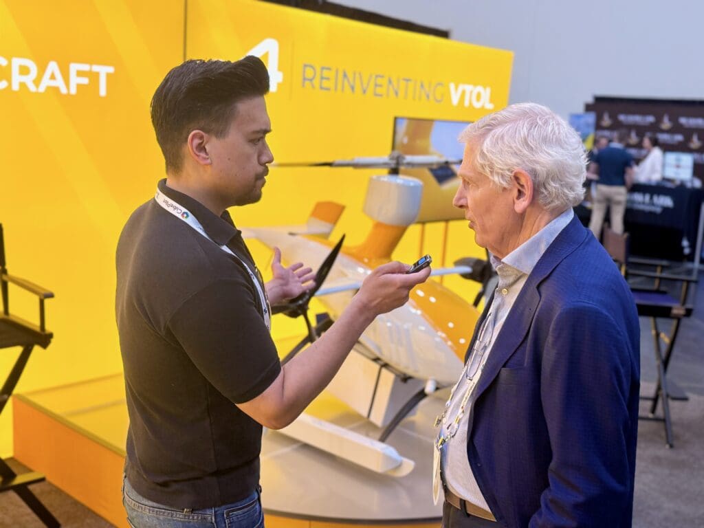 Rory Jackson from Uncrewed Systems Technology, interviews Gad Shaanan at the Unmanned Aerospace booth with the GH-4 drone.